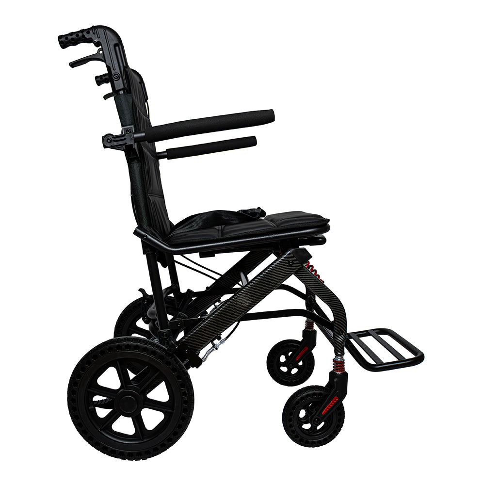 Silla de ruedas de traslado de lujo para viaje, plegado tipo maleta, acabado fibra de carbono con amortiguadores