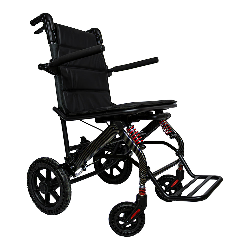 Silla de ruedas de traslado de lujo para viaje, plegado tipo maleta, acabado fibra de carbono con amortiguadores